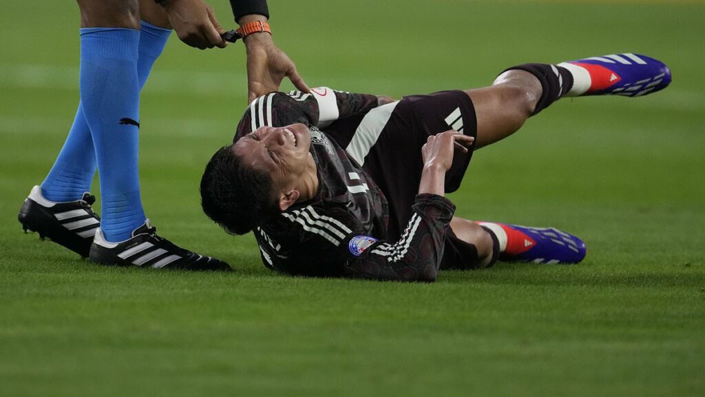 Mexico captain Edson Alvarez limps off the pitch in TEARS… with fears that the West Ham star's Copa America could already be over after suffering a hamstring injury