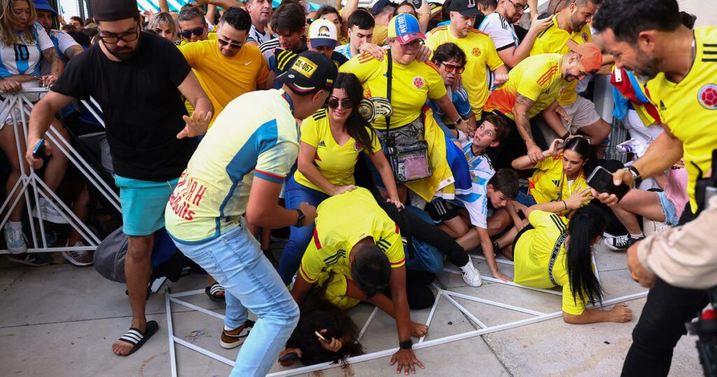 Copa America final between Argentina and Colombia delayed after crowd breaches security gates