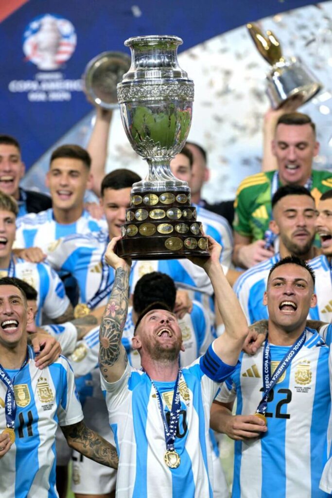 Messi lifts Copa America trophy with Di Maria and Otamendi!