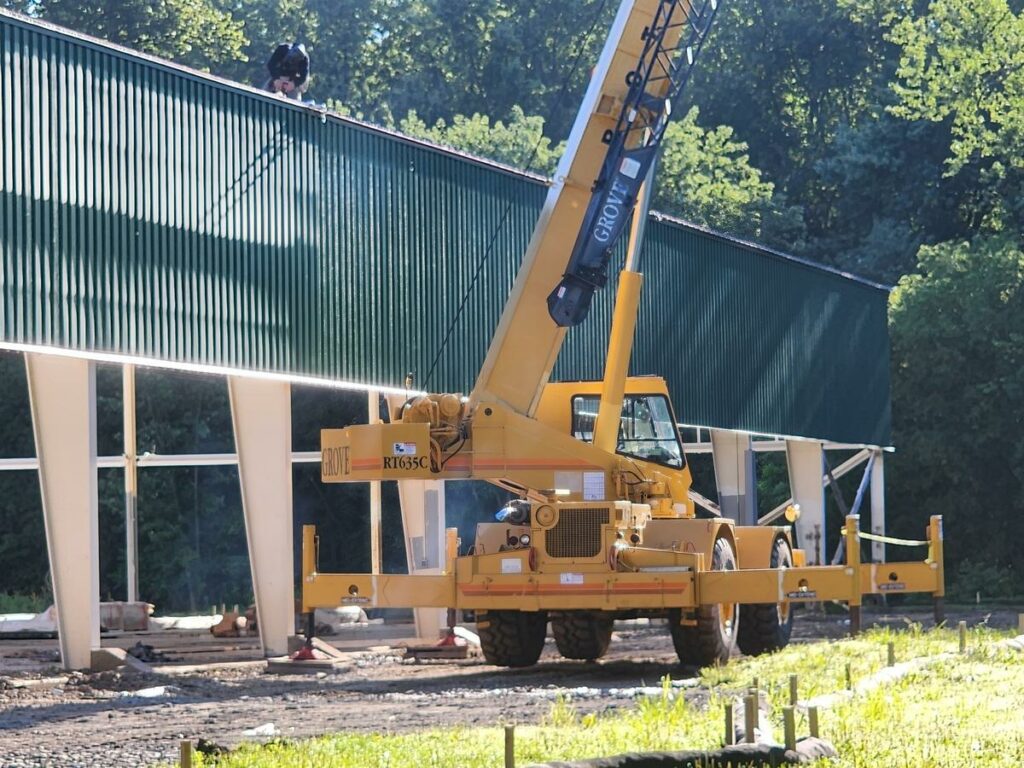 Workers Installing New Roof, Constructing Fields at Grippen Park