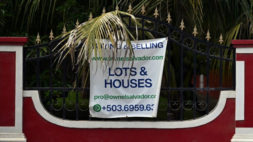 A sign advertising property in El Salvador.