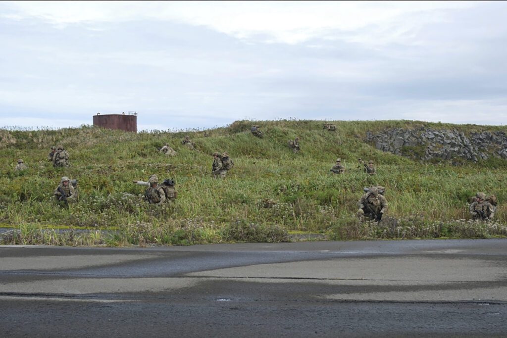 In this image released by the U.S. Army, U.S. Army soldiers assigned to 1st Battalion, 501st Parach...