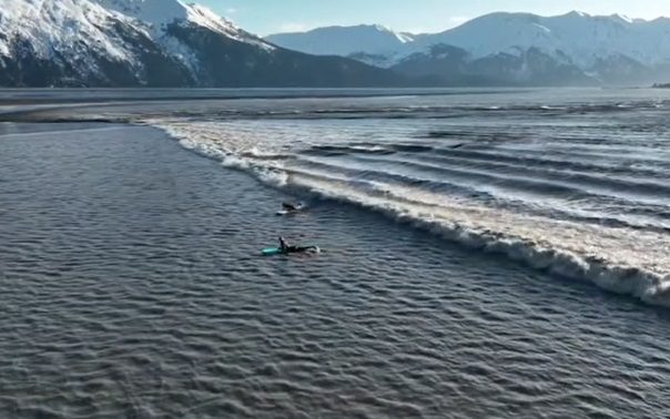 Internet in Awe As Surfers Ride 'Insane' Rare Wave in Alaska