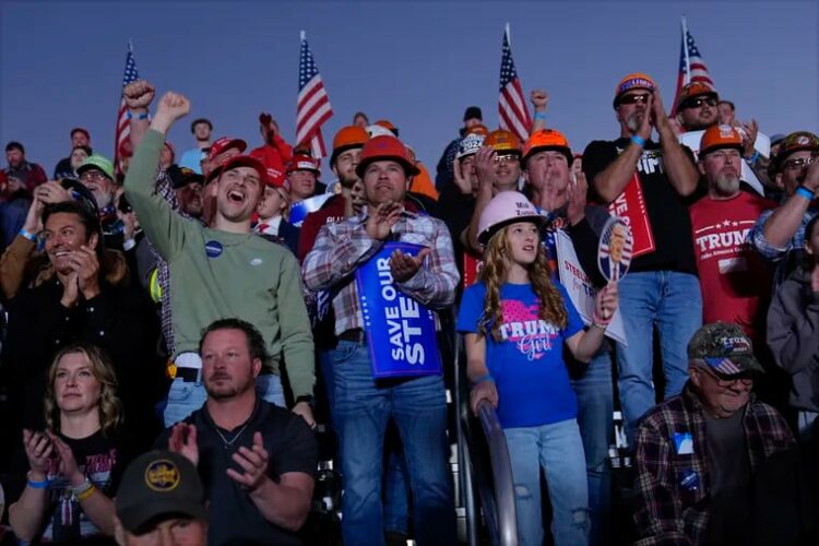 Supporters listen as Republican presidential nominee former President Donald Trump speaks during a campaign rally at Arnold Palmer Regional Airport, Saturday, Oct. 19, 2024, in Latrobe, Pa.