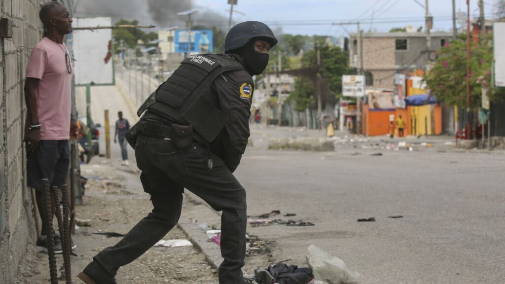 Haiti's main airport and capital frozen after a day of violence