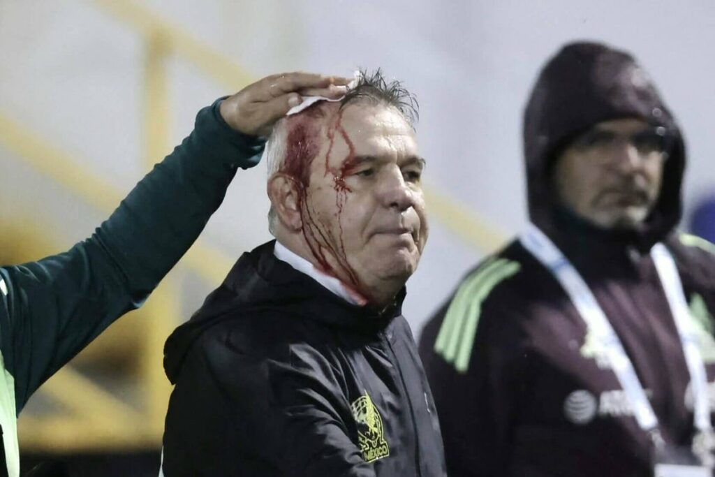 Honduras given supporter ban after Mexico head coach Javier Aguirre struck by projectile