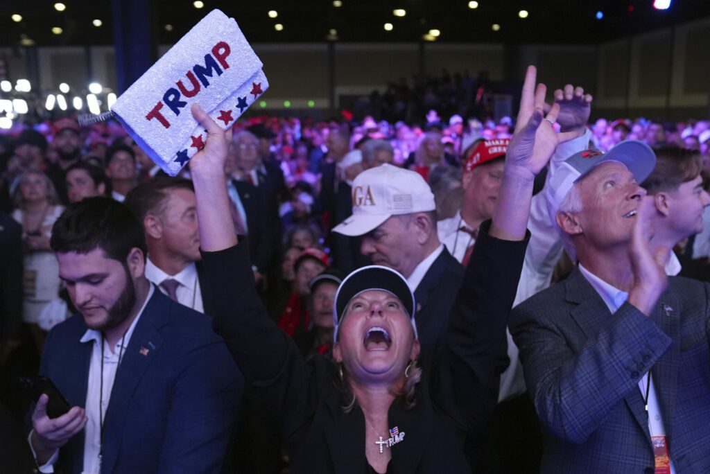 Supporters watch returns at a campaign election night watch party for Republican presidential nomin...