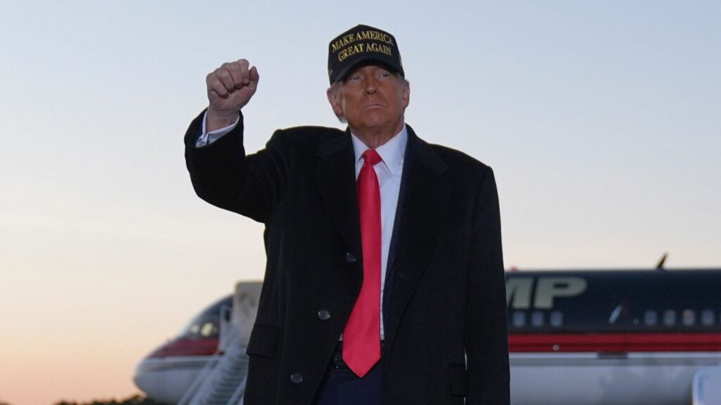 Republican presidential nominee former President Donald Trump gestures at a campaign rally at Kinston Regional Jetport, Sunday, Nov. 3, 2024, in Kinston, N.C. (AP Photo/Evan Vucci)