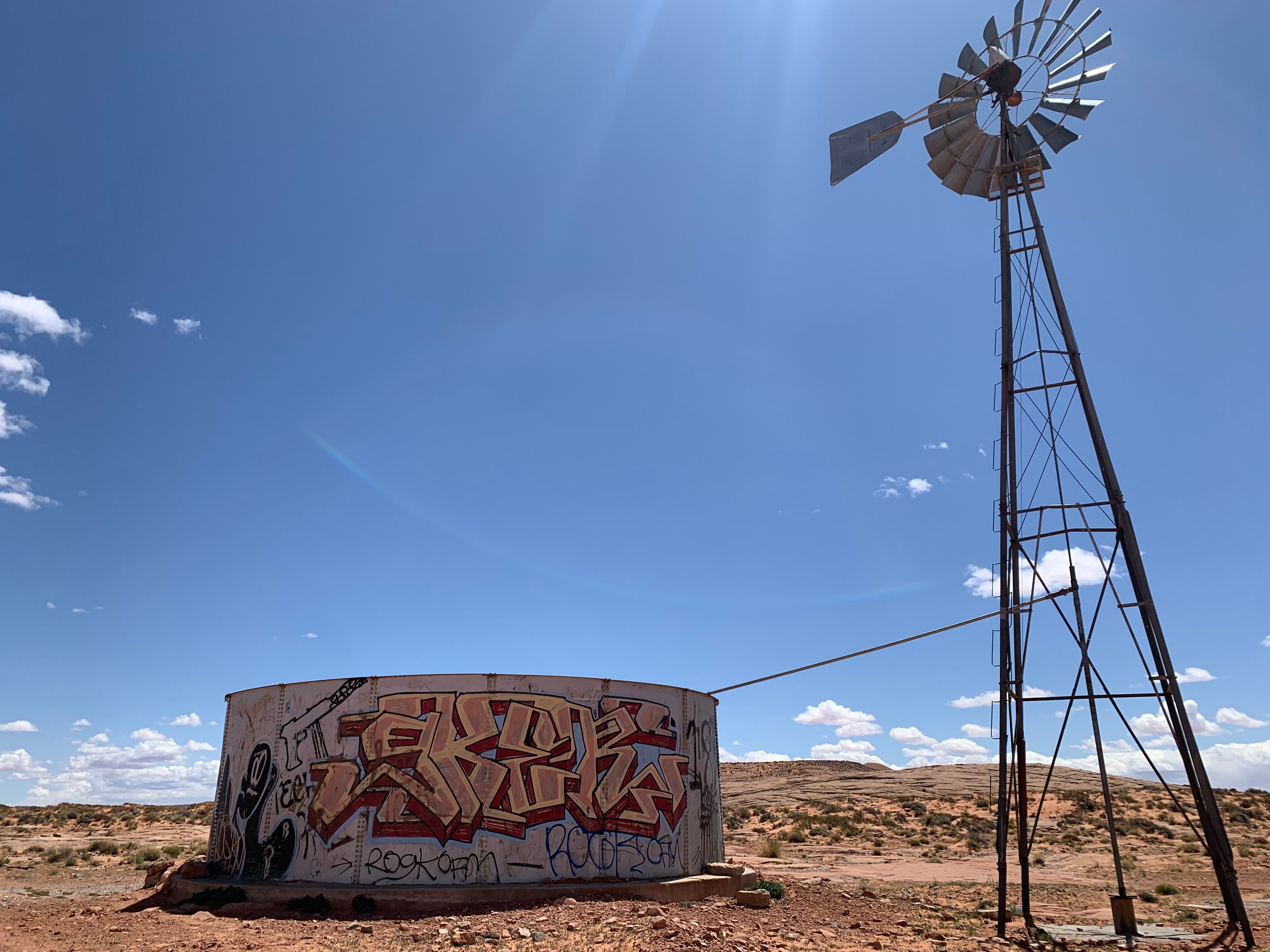 A water tank and windmill, suggested by a medicine man to be the potential site of remains, is seen on the Navajo Nation on April 23rd, 2022.
