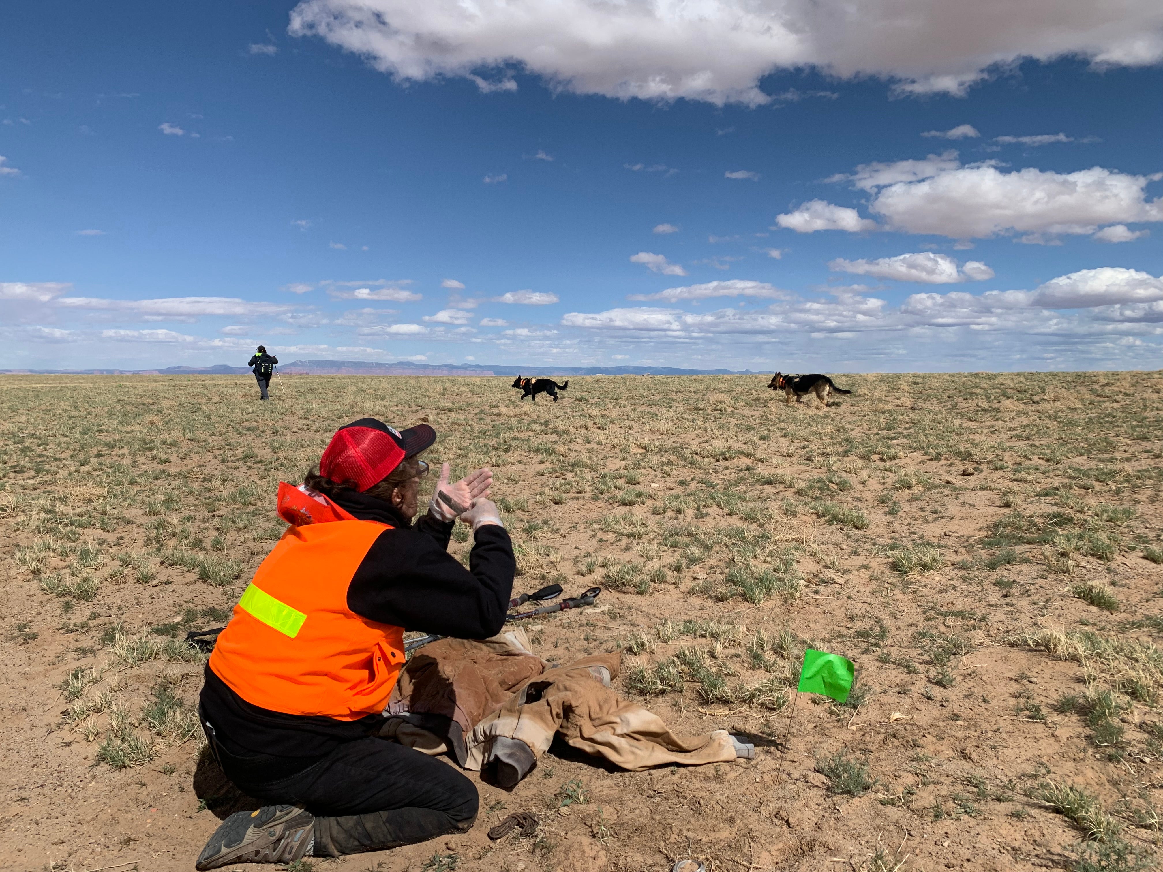 Volunteers with Four Corners K9 Search and Rescue are seen during a search for a missing person on the Navajo Nation on 23 April 2022.