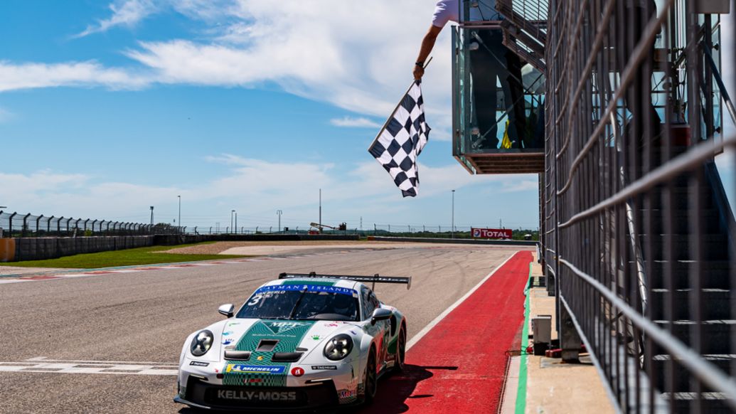 Porsche Carrera Cup North America Presented by the Cayman Islands - Kay van Berlo (Netherlands) takes the Race 2 checkered flag at COTA, 911 GT3 Cup, 2021, PCNA