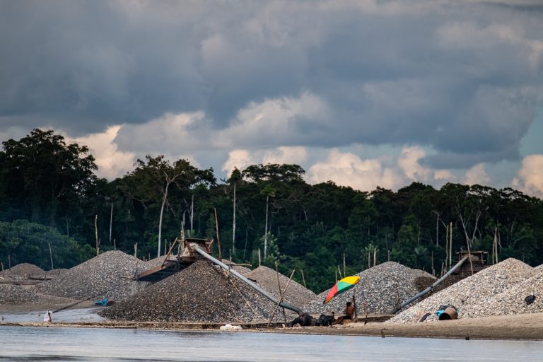 Illegal gold mining operations dominate the banks of - and fundamentally change the landscape and ecology of — the Madre de Dios River upstream of Puerto Maldonado, Peru. Photo courtesy Jason Houston/Upper Amazon Conservancy.