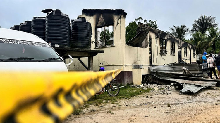 Fire that killed 19 in Guyana school dorm may have been set 'maliciously'