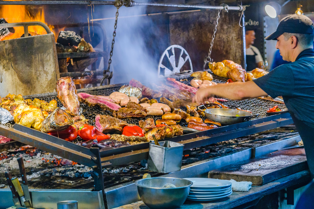 Several Different Kinds of Meats Being Cooked in a Traditional Food Market, Ciudad Vieja, Montevideo, Uruguay
