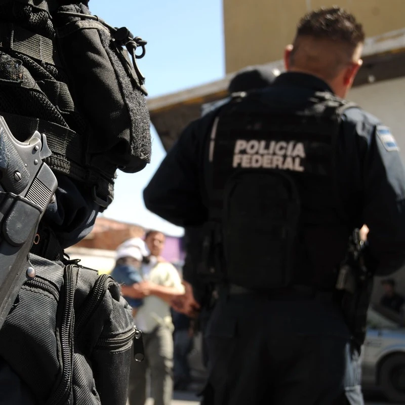 Police Officer In Mexico Pictured From The Back, Latin America