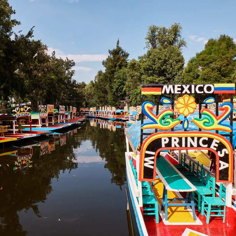 Colorful Gondolas In The Canals Of Xochimilco, Mexico City, Mexico, Latin America