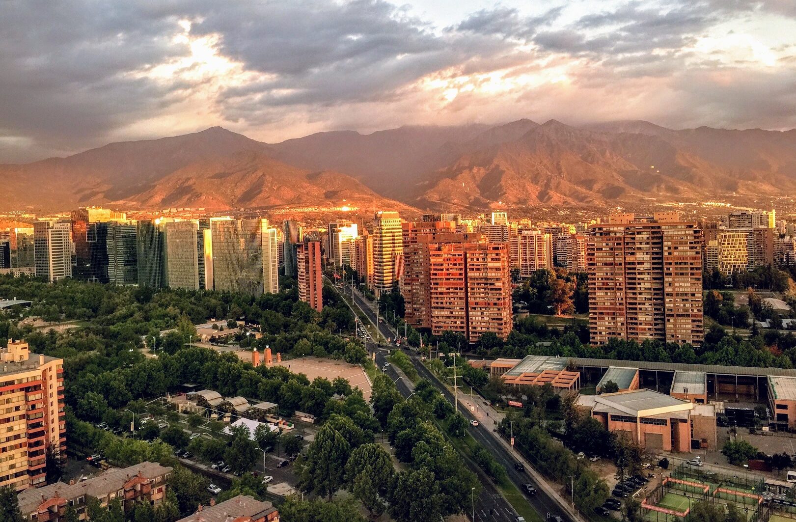 a city with mountains in the background