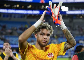 Don't try this on Pickford! Moment Canada goalkeeper is caught HIDING his opposite number's water bottle during penalty shoot-out defeat by Uruguay in Copa America third-place play-off