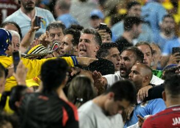 Uruguay players clash with fans after Colombia's win