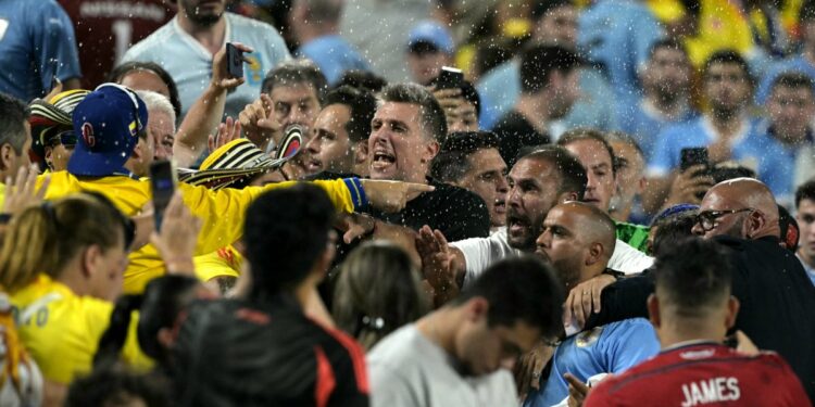 Uruguay players clash with fans after Colombia's win