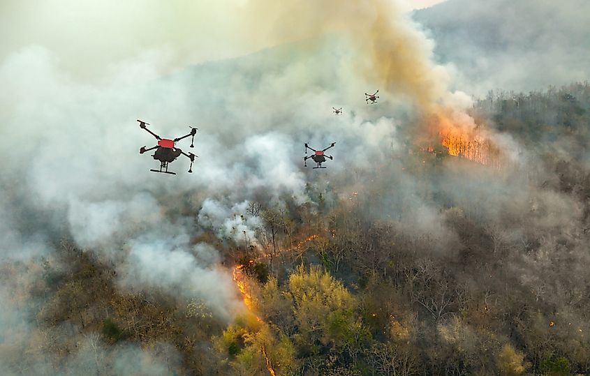 Firefighting drones spray chemical to help control wildfires.