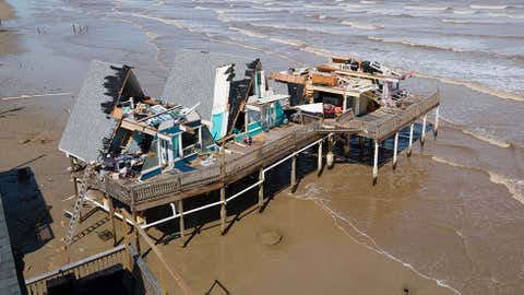 An aerial view shows a destroyed home in Surfside Beach, Texas, on July 8, 2024, after Hurricane Beryl made landfall. (Mark Felix/AFP via Getty Images)