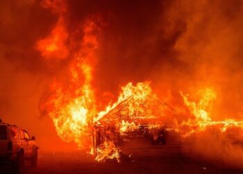 Man arrested for pushing burning car into gully, starting California’s largest active wildfire