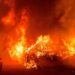 Man arrested for pushing burning car into gully, starting California’s largest active wildfire