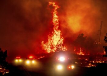 California’s largest wildfire grows in size as fires rage across US west