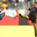 Brazil's Lucas Paqueta and Colombia's Daniel Munoz fight for a ball