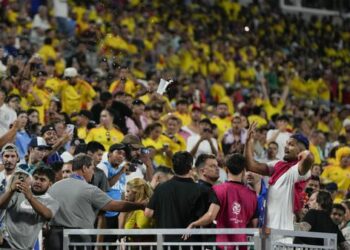 Colombia wins contentious Copa América semifinal to set up Lionel Messi showdown; Uruguay players brawl in crowd