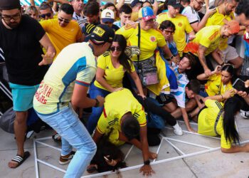 Copa America final between Argentina and Colombia delayed after crowd breaches security gates