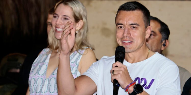 SANTA ELENA, ECUADOR - OCTOBER 15: Newly elected President of Ecuador Daniel Noboa of Acción Nacional Democrática coalition (R) speaks next to his wife Lavinia Valbonesi (L) after winning the presidential runoff at Olon coast on October 15, 2023 in Santa Elena, Ecuador. According to official results, Daniel Noboa of Accion Democratica Nacional has 52,28% of the votes and Luisa Gonzalez of Revolucion Ciudadana has 47,72%, with 91,05 of the voting counted. Noboa will complete the 2021-2025 period after President Guillermo Lasso applied the "cross death" to dissolve parliament a call for early elections. (Photo by Franklin Jacome/Getty Images)