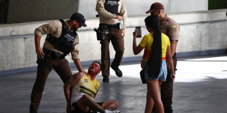 Hundreds of Colombian fans crash gate as absolute CHAOS breaks out before Copa America final against Argentina in Miami
