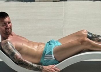 Lionel Messi puts his feet up as Argentina captain relaxes in the sun with wife Antonela after damaging ankle ligaments in Copa America final