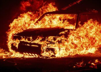 Scores of wildfires scorching swaths of the US and Canada