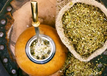 tilialucida/Alamy Yerba mate in a traditional calabash gourd and bag of dry herb