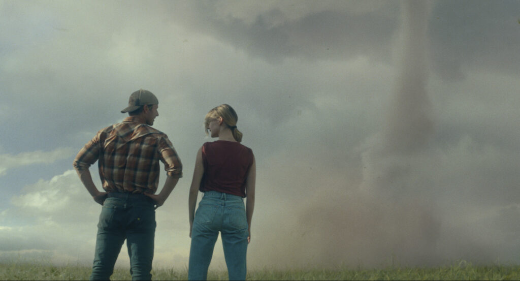 'Twisters' whips up $80.5 million at box office in North America. This image released by Universal Pictures shows Glen Powell, left, and Daisy Edgar-Jones in a scene from 