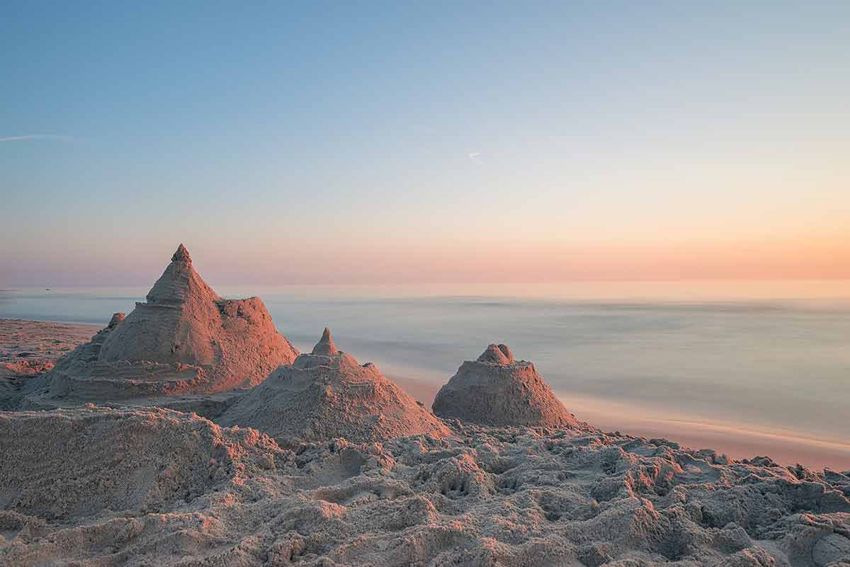 arizona beaches packed pink dusk over beach sand castles