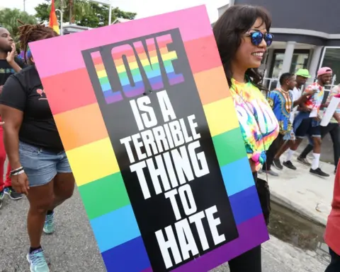 Sean Drakes via Getty Supporters of LGBT rights and equality conclude three weeks of solidarity-building events with a festive parade during the first annual Pride Arts Festival on July 28 in Port of Spain, Trinidad