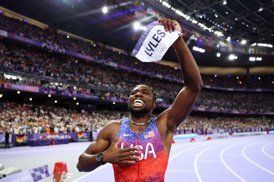 PARIS, FRANCE - AUGUST 04: Noah Lyles shows painted nails of Team United States celebrates winning the gold medal in the Men's 100m Final on day nine of the Olympic Games Paris 2024 at Stade de France on August 04, 2024 in Paris, France. (Photo by Christian Petersen/Getty Images)