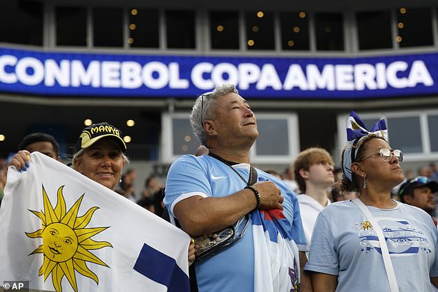 Uruguay football fans listen their national anthem prior to the Copa America third place match against Canada in Charlotte, North Carolina, in July