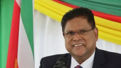 Reuters Chandrikapersad Santokhi speaks during a news conference after being elected as Suriname