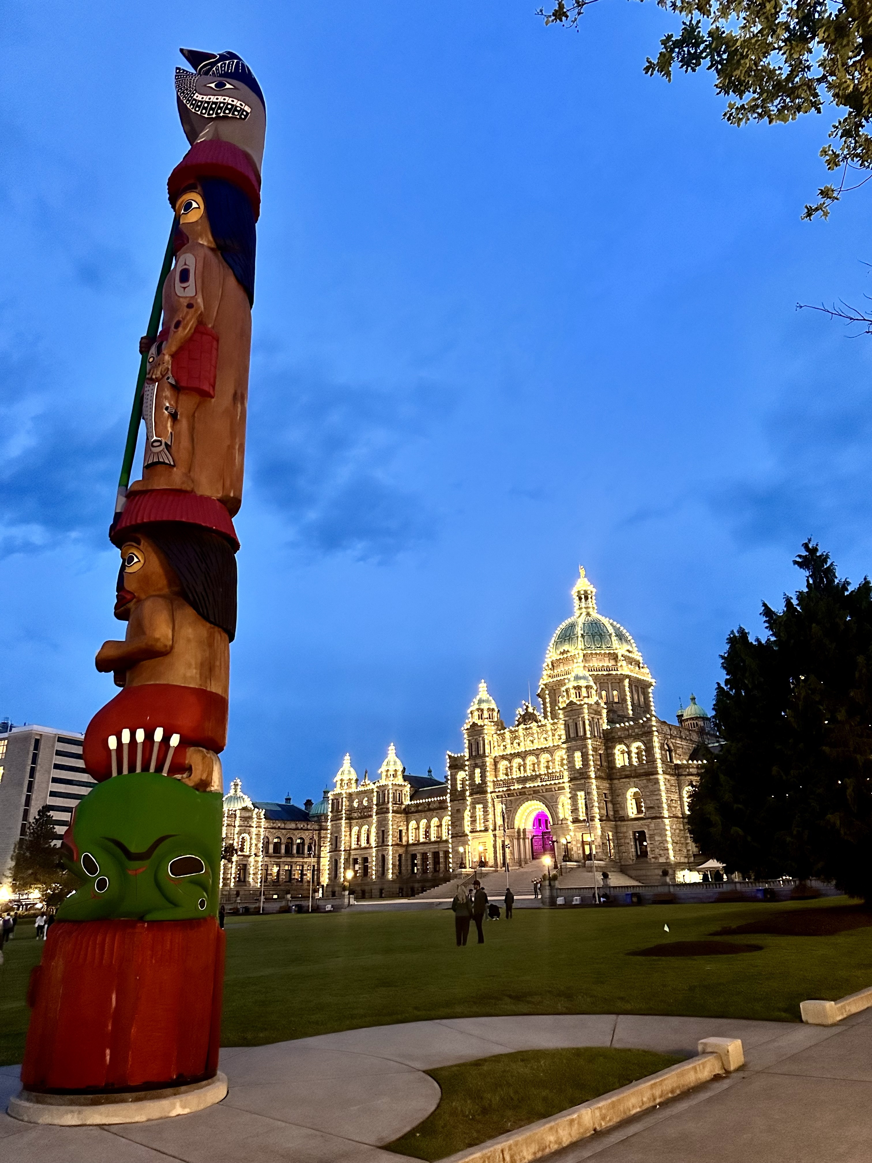 The Legislative Assembly of British Columbia and a totem pole in downtown Victoria