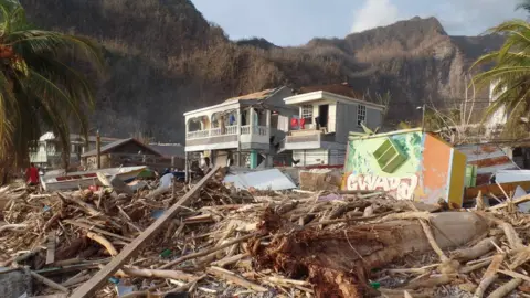 Gemma Handy Destruction in the once picturesque tourist village of Soufriere, on Dominica's south-west coast