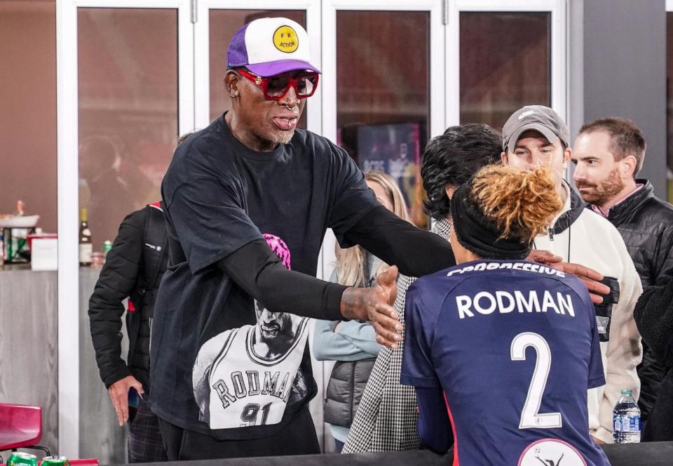 PHOTO: Washington Spirit forward Trinity Rodman with her father basketball legend Dennis Rodman after a game between North Carolina Courage and Washington Spirit at Audi Field, Nov. 7, 2021, in Washington. (Tony Quinn/ISI Photos/Getty Images)