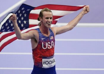 Athletics' golds rock US to medal table top spot