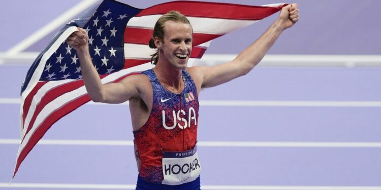 Athletics' golds rock US to medal table top spot