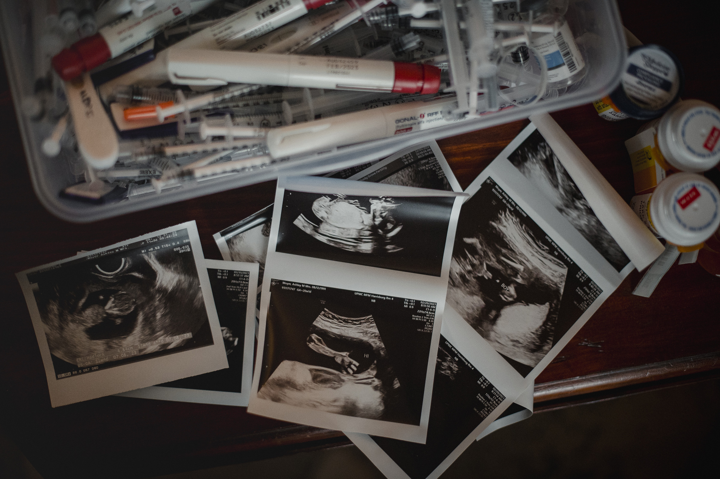 Ashley Moyer, 32, keeps a container full of her IVF needles, injections, syringes and old pill bottles to remember her IVF journey, in Lemoyne, Penn., March 9, 2024.