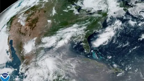 Reuters A plume of dust from the Sahara Desert approaches the United States from the Caribbean in an image from the National Oceanic and Atmospheric Administration (NOAA) GOES-East satellite June 24, 2020.